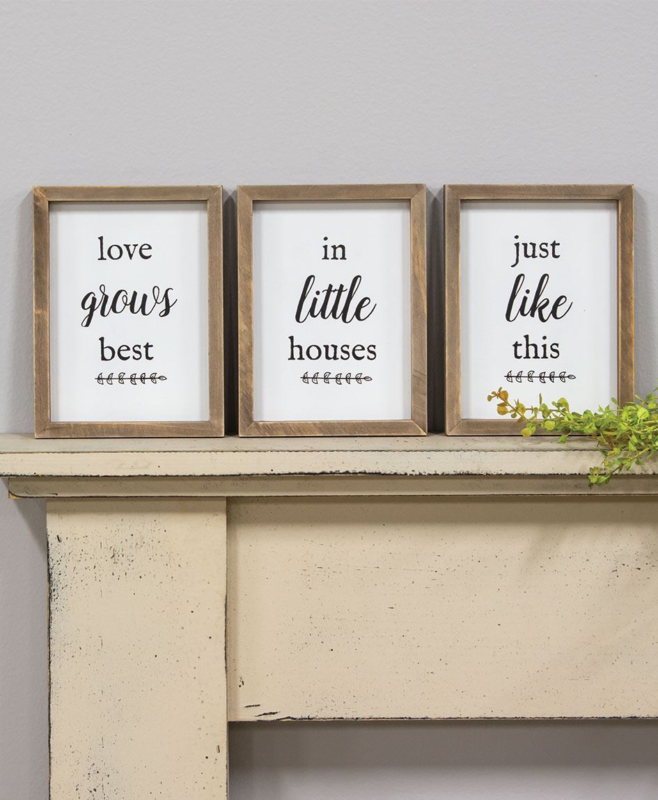 Love you grows best in little houses just like this framed wood sign